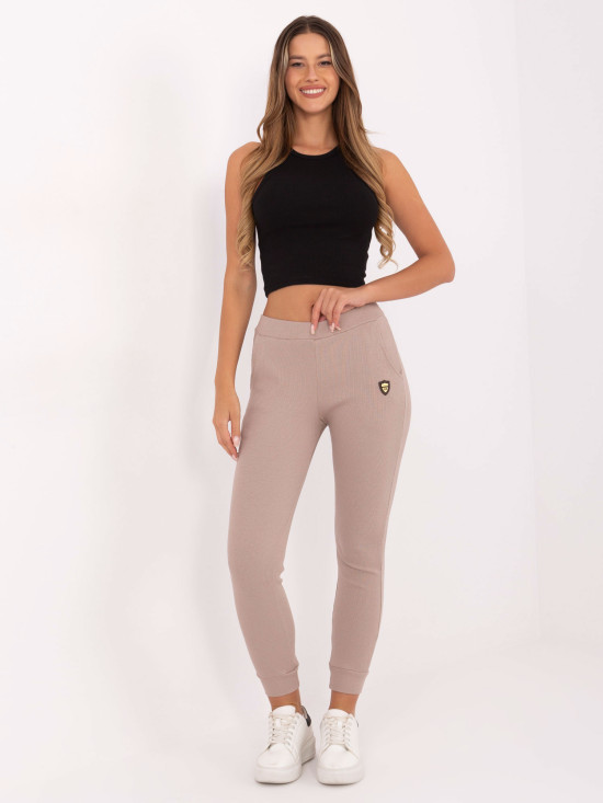 Pantaloni de trening bej cu model reiat