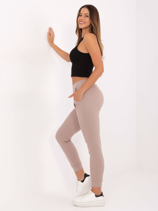 Pantaloni de trening bej cu model reiat