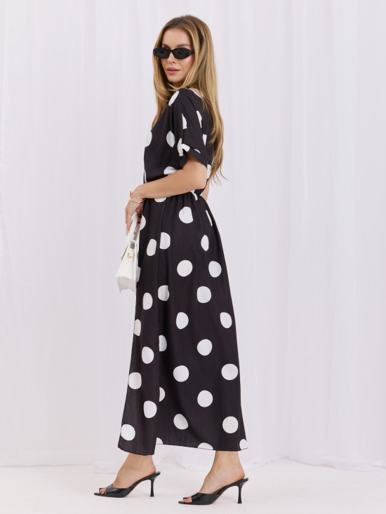 Rochie midi negru-alb cu buline și decolteu petrecut