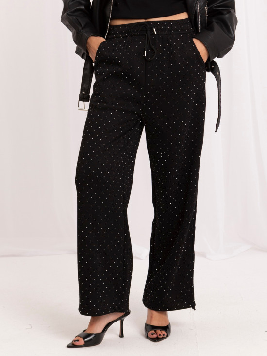 Pantaloni de trening negri cu croială largă și aplicație