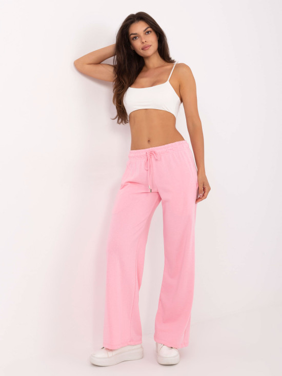 Pantaloni sportivi eleganți în roz deschis