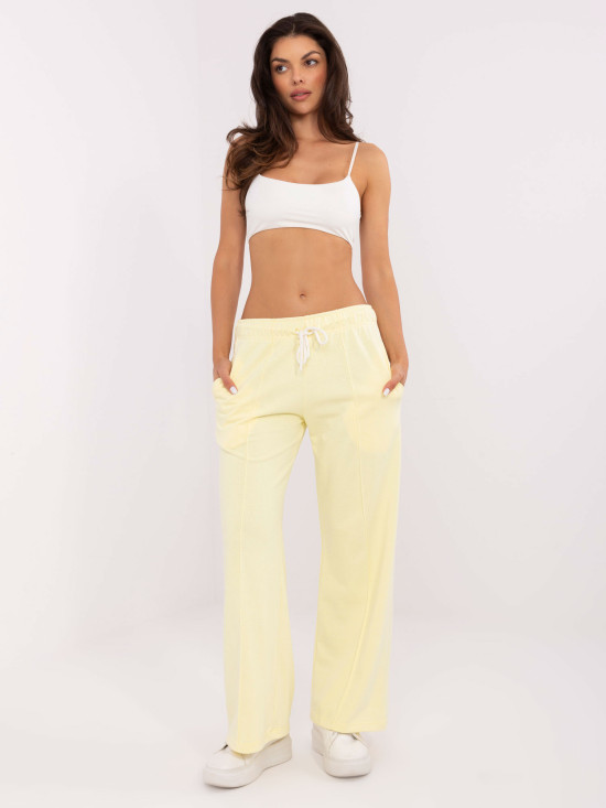 Pantaloni sportivi eleganți în galben deschis