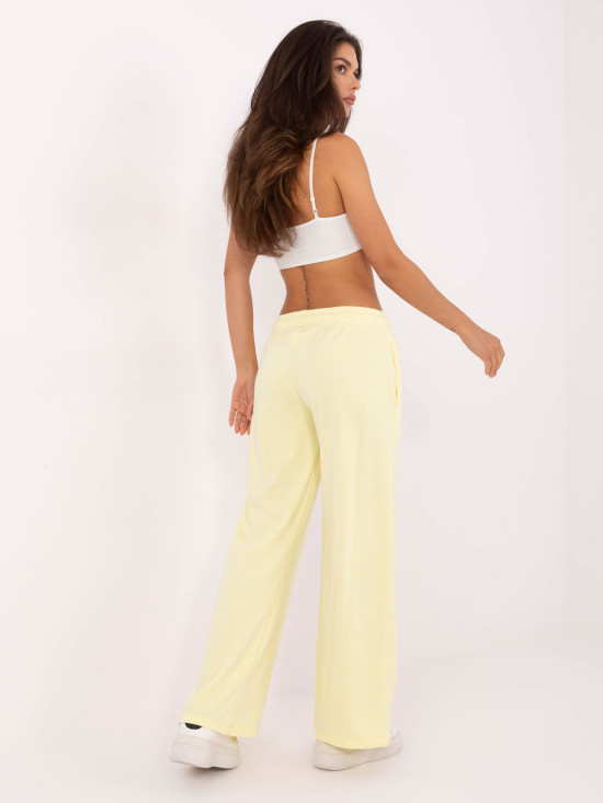 Pantaloni sportivi eleganți în galben deschis