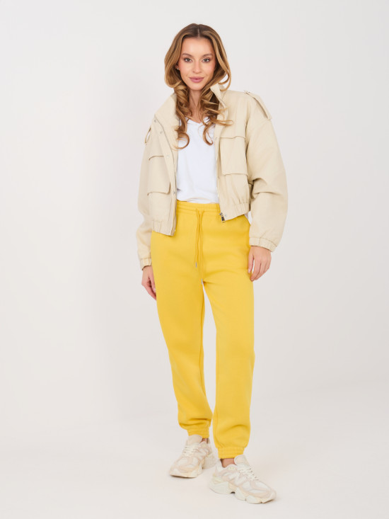 Pantaloni de trening galbeni cu talie înaltă și buzunare laterale