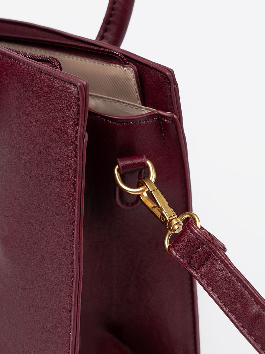 Geantă bordo cu cataramă decorativă de culoare aurie