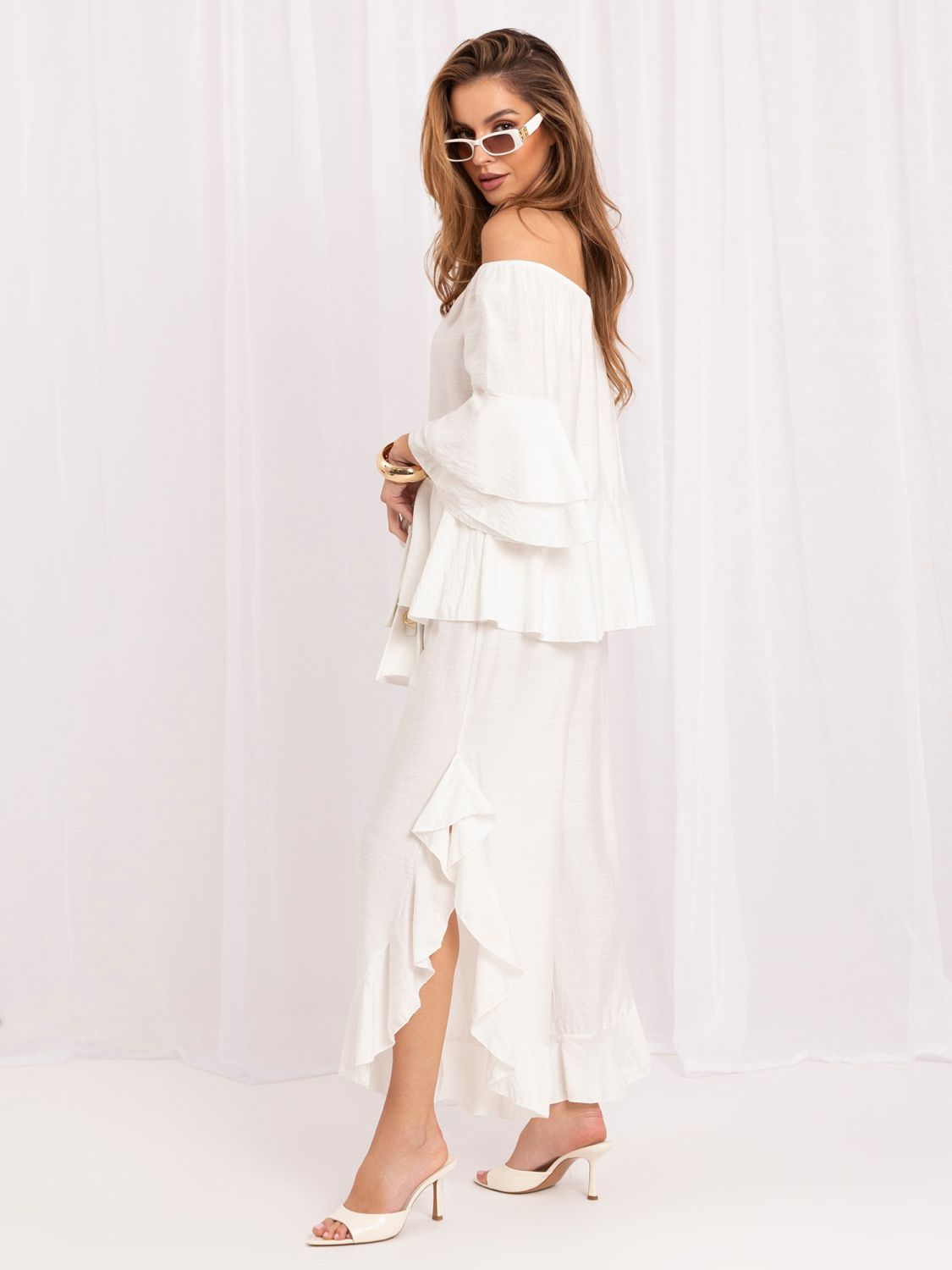 Set elegant cu bluză și pantaloni ecru