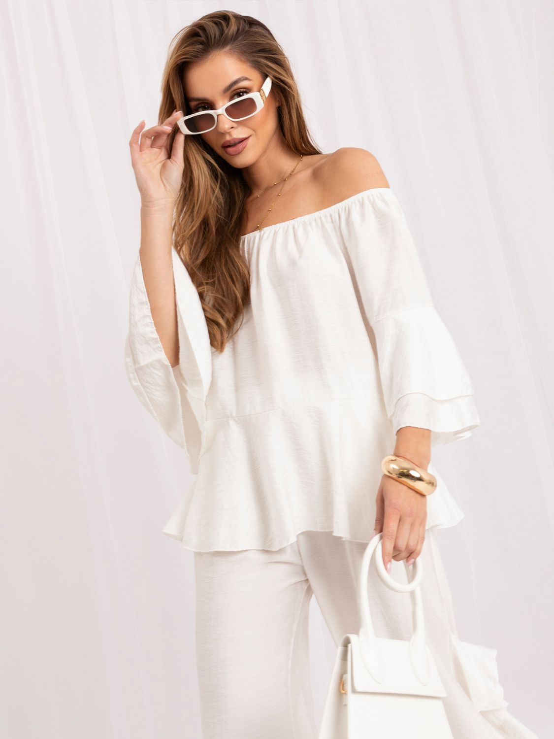 Set elegant cu bluză și pantaloni ecru