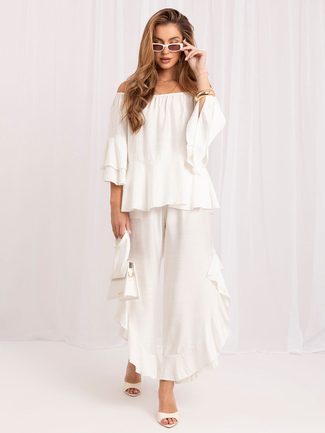 Set elegant cu bluză și pantaloni ecru