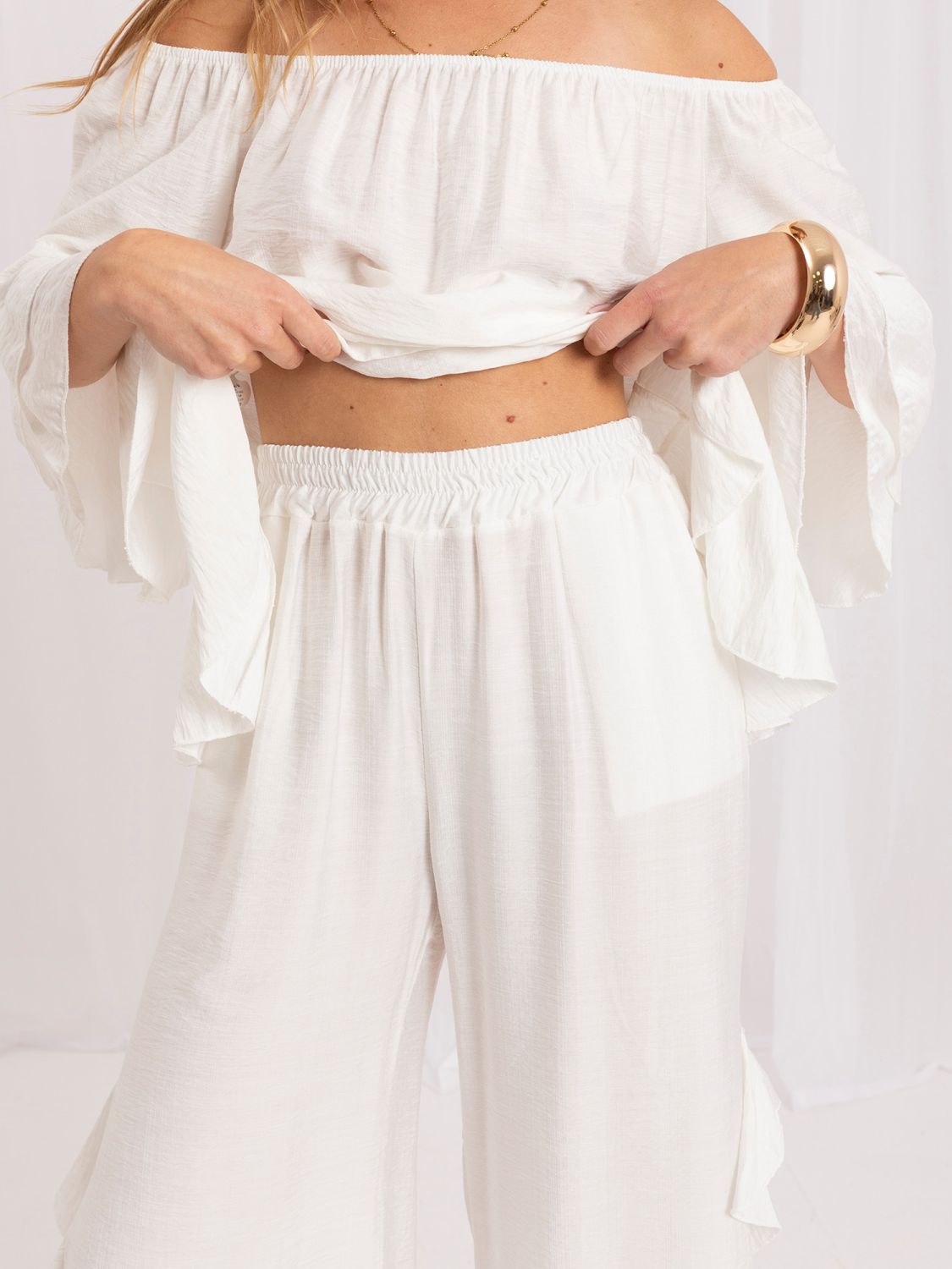 Set elegant cu bluză și pantaloni ecru