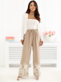 Pantaloni bej largi cu broderie