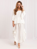Set elegant cu bluză și pantaloni ecru