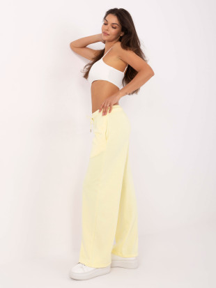 Pantaloni sportivi eleganți în galben deschis
